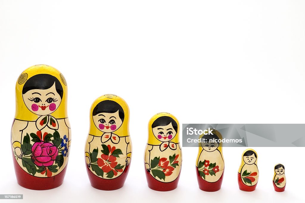 Russian matryoshka dolls in different sizes Set of russian dolls of decreasing sizes. Usually are placed one inside another.  Russian Nesting Doll Stock Photo