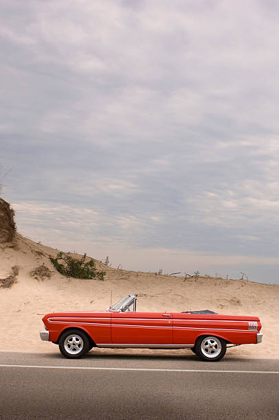 istock Classic red convertible in the desert - scenic 157186591