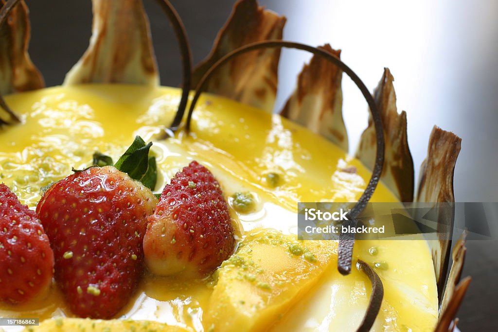 Strawberry Mango Cake Close-up of homemade strawberry mango mousse cake. Baked Pastry Item Stock Photo