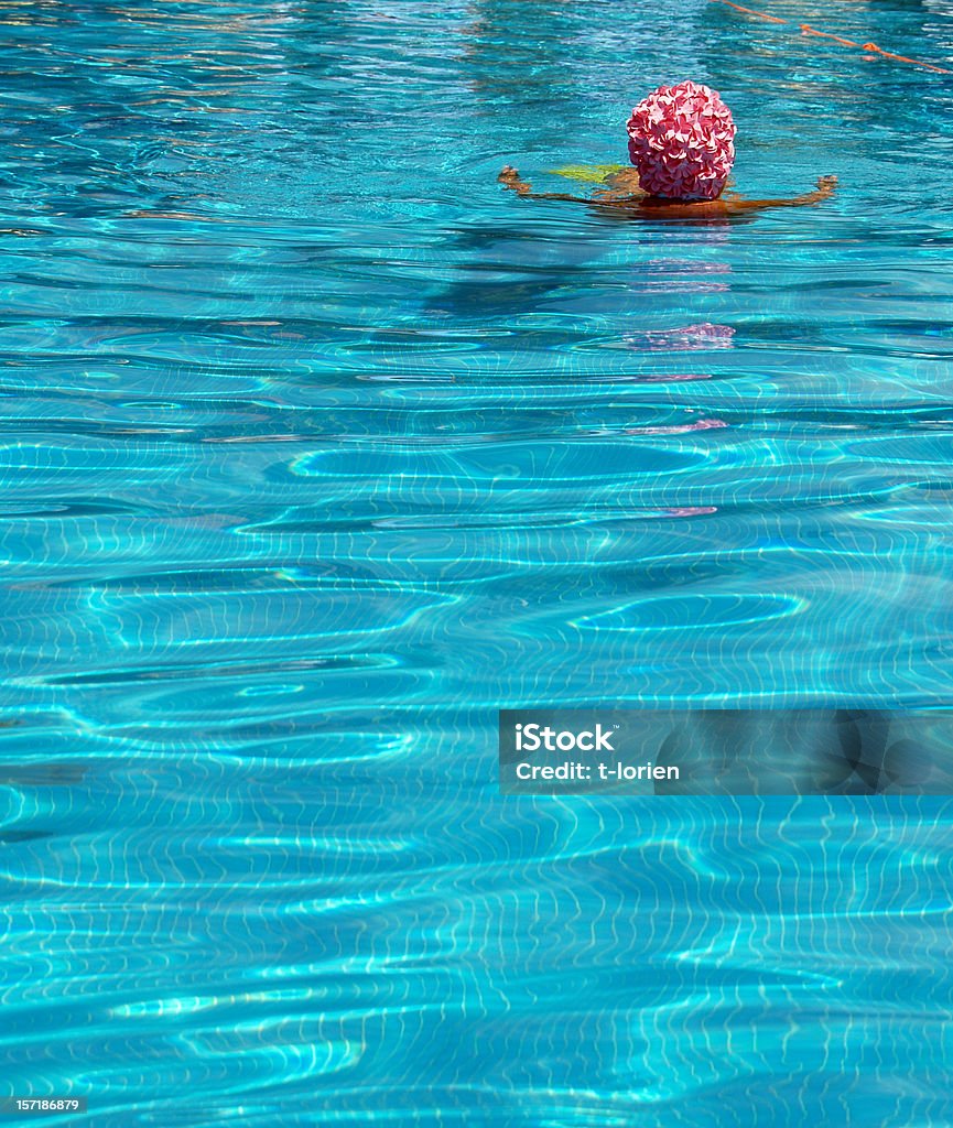 Pink Hood Fancy has w. woman in swimming pool. Active Lifestyle Stock Photo