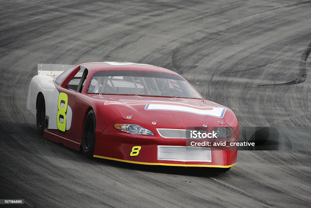 Motorsports-Red Race Car A late model stock car racing on an oval track. Stock Car Stock Photo