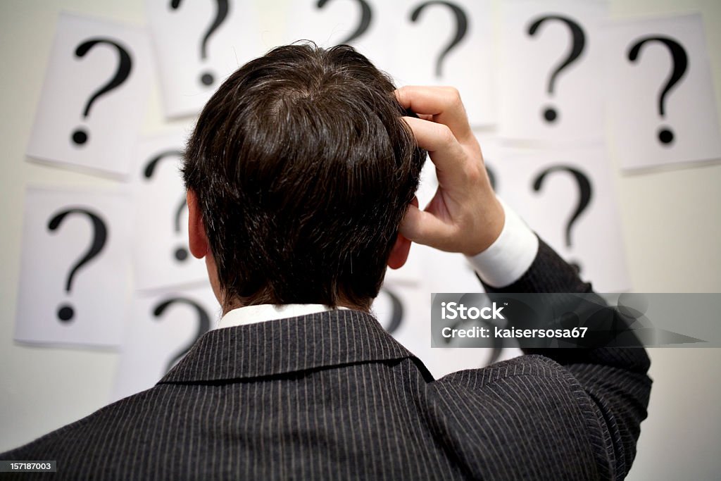 indecision a businessman undecided Adult Stock Photo