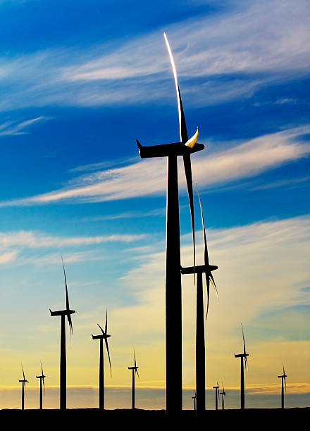 Close-up of giant wind turbines producing renewable energy stock photo