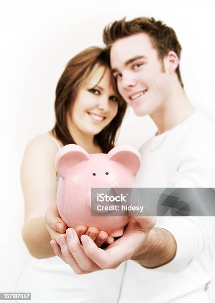 Saving Together Stock Photo - Download Image Now - Adolescence, Adult, Banking