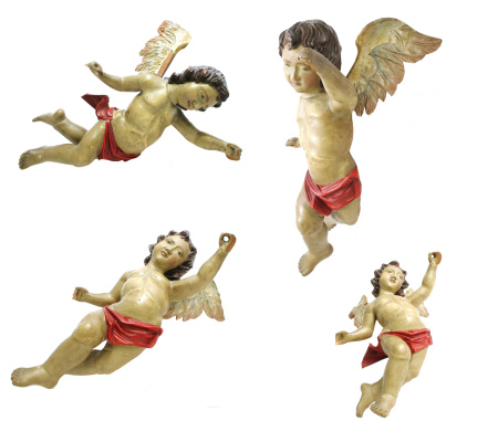 isolated old wooden angels