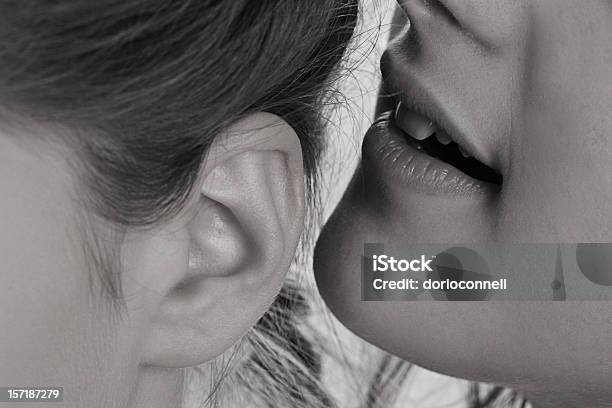 Telling Secrerts Stock Photo - Download Image Now - Gossip, Whispering, Human Ear