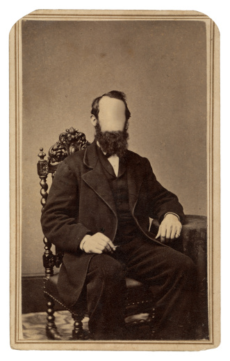 vintage portrait of bearded man with facial features removed