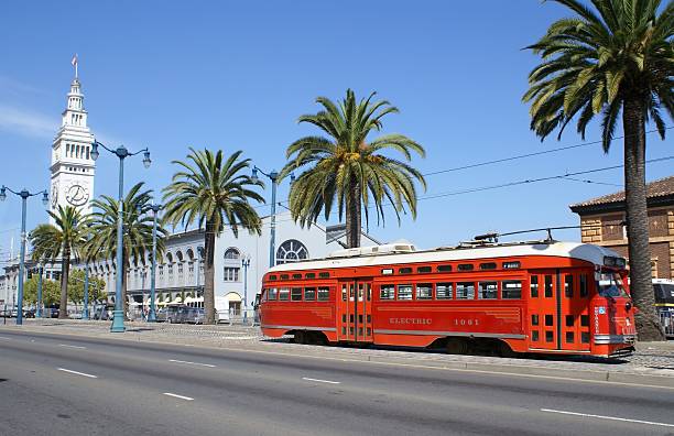 san francisco ferry building und dem trolley - cable stayed stock-fotos und bilder