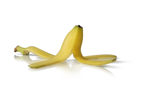 On to the next 500 Downloads. A banana skin shot on glass for reflection. Focus is on the main part of the banana.