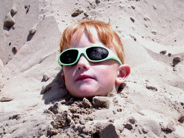 Burried in Sand stock photo