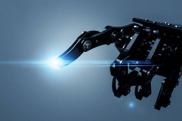 istock Real robot's hand pointing or pushing on something. Concepts of AI development and robotic process automation 1571882901
