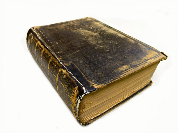 Old Book - Bible Very old worn bible. printed in 1881. new testament stock pictures, royalty-free photos & images
