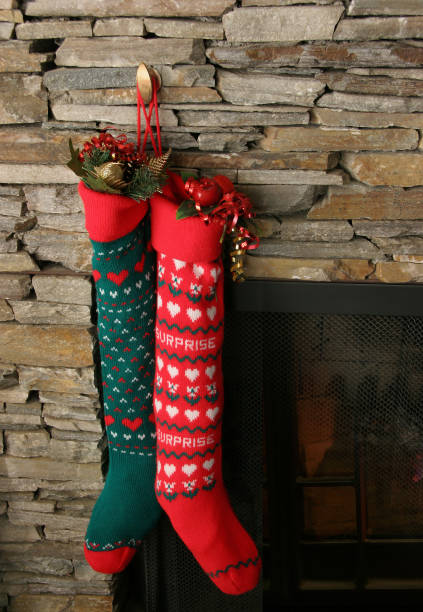 istock Christmas Stockings Hanging On Fireplace 157188410