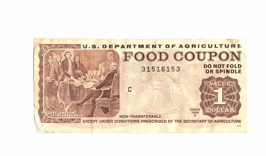 $1 Food Coupon.  Grunge and textured details.  Issued first in 1989.  Same monetary value as U.S. currency but can only be used to buy food.  Given by the government to people in need.  Serial number has been altered, to protect the poor.
