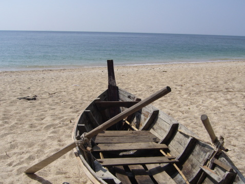 An old boat on Long beach, Lanta island / Thailand 