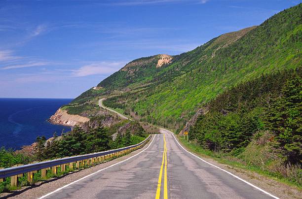 Cabot Trail Nova Scotia Cabot Trail through the mountains of the Cape Breton National Park, Nova Scotia cabot trail stock pictures, royalty-free photos & images