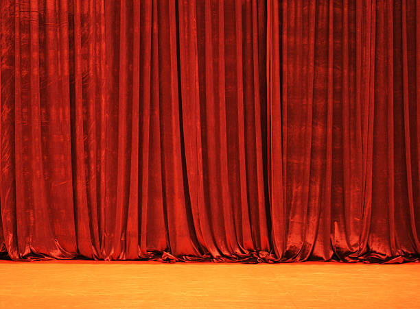 Stage Red curtain on the stage. hanging fabric stock pictures, royalty-free photos & images