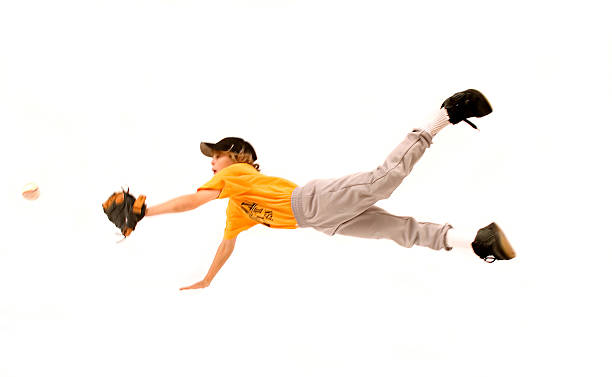 flying baseball catch A 12-year old boy plays baseball baseball isolated on white stock pictures, royalty-free photos & images