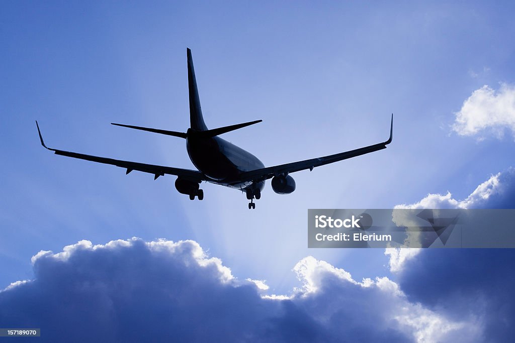 Into the Clouds (Airliner)  Aerospace Industry Stock Photo