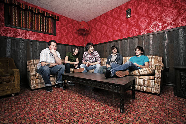 istock Male Group Sitting in Brightly Colored Room 157189234