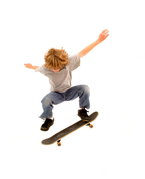 young skateboarder stock photo