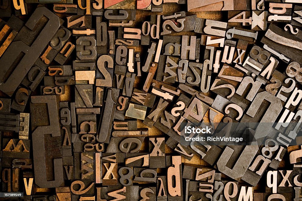 Wood Type Conglomerate A bunch of pieces of wood type. Makes a great background image. The two credit size would make a killer desktop background for any designer. Text Stock Photo