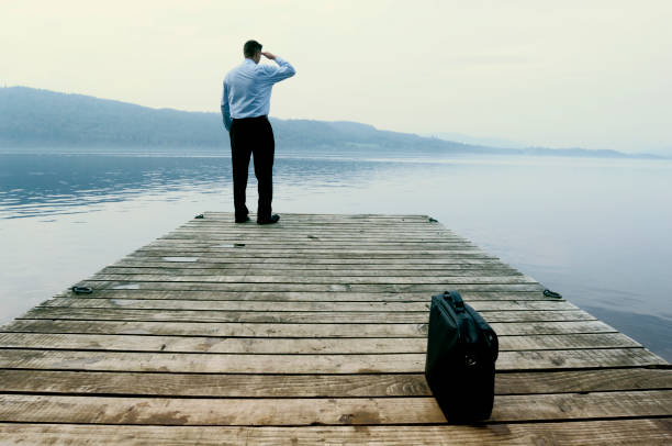 istock businessman in unusual situation 157189589