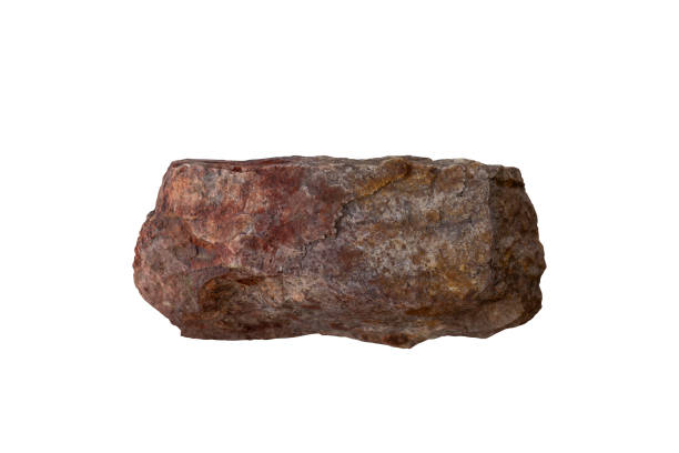 istock Brown stone or rock isolated on white background included clipping path. 1571897098