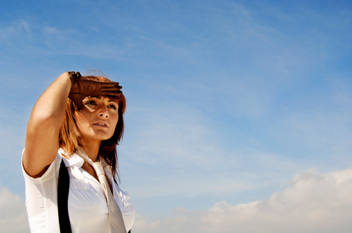 Woman scanning the horizon;Istockalypse Barcelona, Images taken in Mapfre Tower;