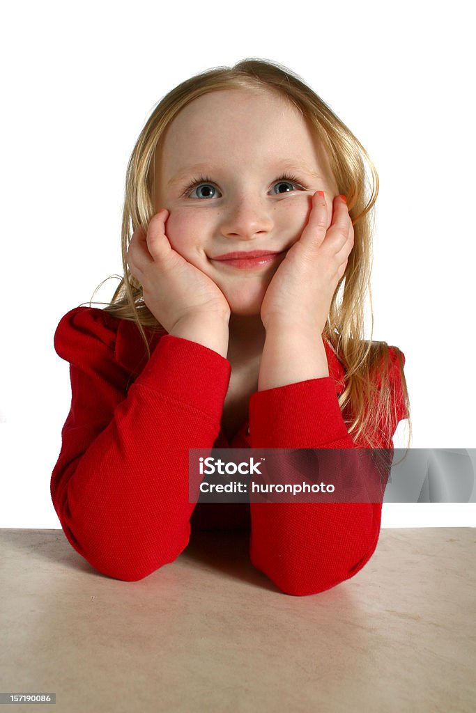 happy thoughts young girl resting her head in her hands thinking happy thoughts 6-7 Years Stock Photo