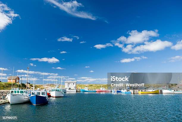 Fishing Boats On The Sea On A Cloudy Day Stock Photo - Download Image Now - Nova Scotia, Trawler, Cape Breton Highlands National Park