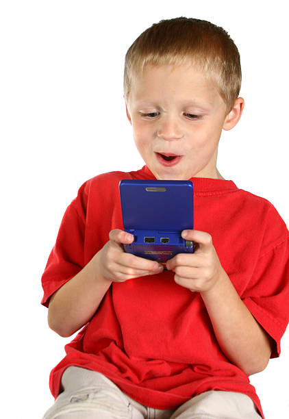 videojugador 2 - video game child handheld video game little boys fotografías e imágenes de stock