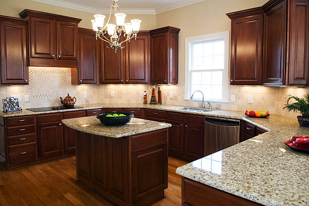 istock Large kitchen with a center island and granite countertops 157190525