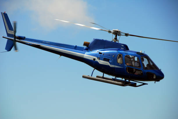 istock Blue helicopter flying against the blue sky 157190651