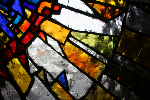 Partial view of a modern stained glass window.