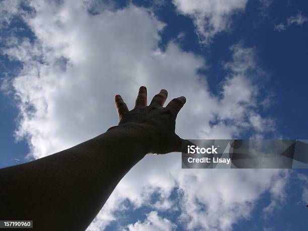 Hand Reaching Up Into The Sky Stock Photo - Download Image Now - Aspirations, Color Image, Determination
