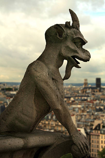istock Gargoyle in Paris Notre Dame Cathedral 157191061