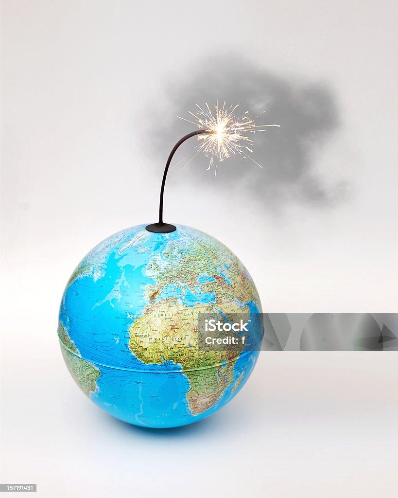 Globe bomb with smokey lit fuse on white background  Planet - Space Stock Photo