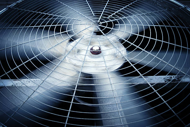 Large rotating fan of a commercial or industrial HVAC system stock photo