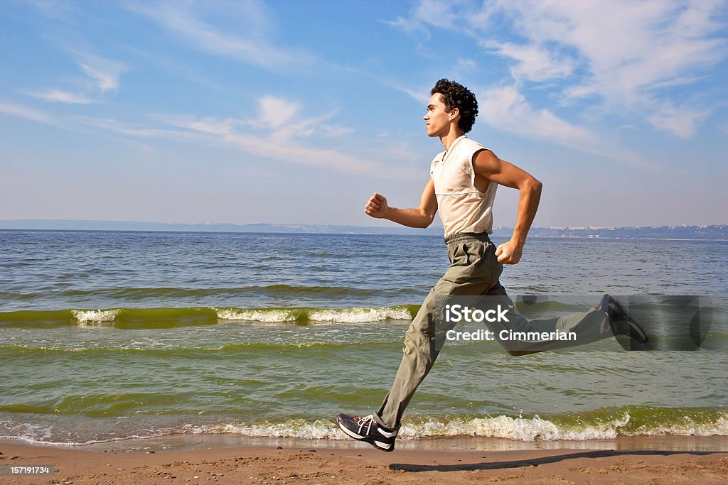Running uomo - Foto stock royalty-free di Adulto