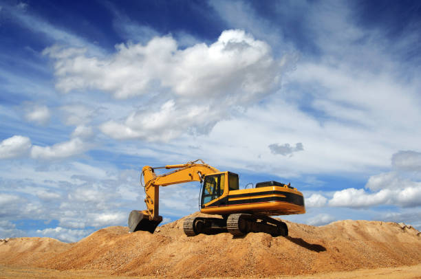 Bulldozer Excavator performing earthworks sand mine stock pictures, royalty-free photos & images