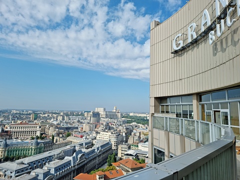 The Grand Hotel Bucharest is a 24-story 87 m high-rise five-star hotel situated near University Square, Bucharest, in Sector 1. The image shows the hotel during a sunny day in summer season.