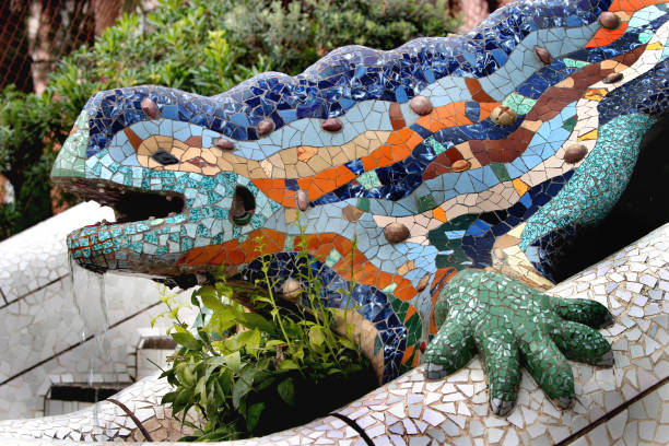 Famous colorful ceramic mosaics detail, designed by Antonio Gaudi and better known as \