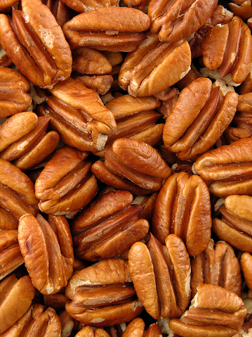 Macro shot of group of peeled pecan nuts