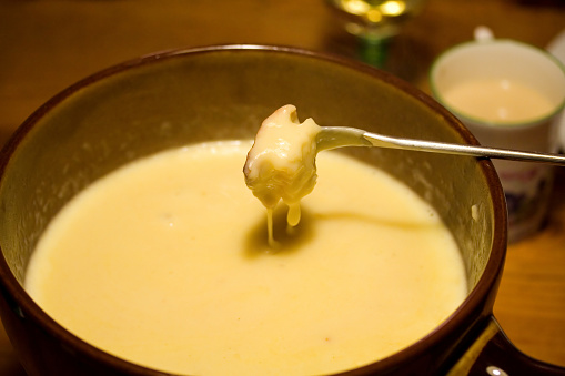 Eating cheese fondue