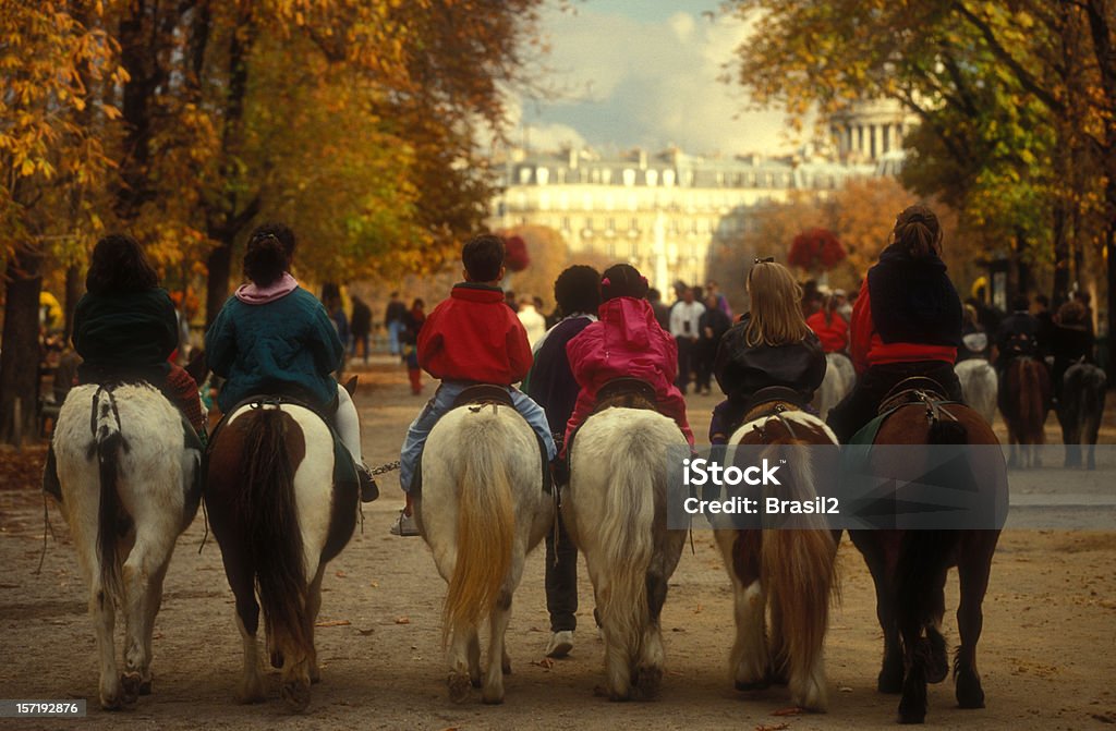 Équitation à Paris - Photo de Enfant libre de droits