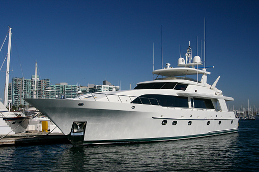 Large white mega yacht worth millions of dollars