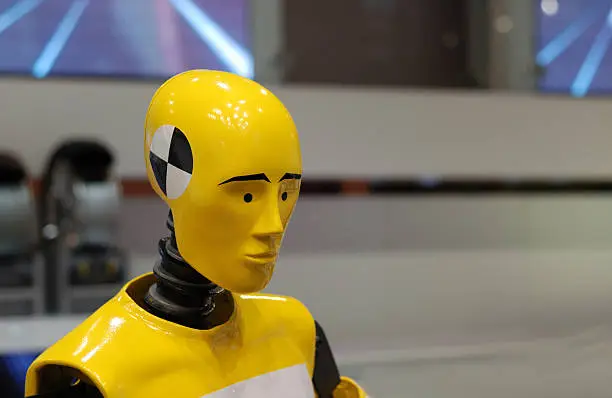 portrait of yellow crash test dummy