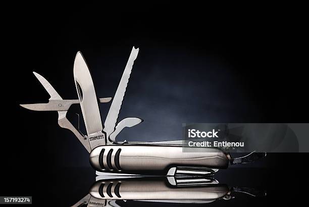 Isolated Gray Pocket Knife With Its Tools Extended Stock Photo - Download Image Now - Penknife, Switzerland, Swiss Culture