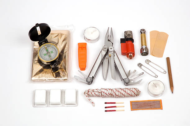 Contents of a survival kit on display stock photo
